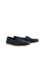 Pair of navy blue leather shoes on a light gray background