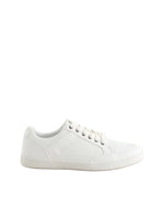 White sneaker on a light gray background
