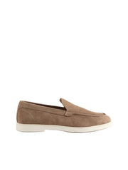Brown suede loafer shoe on a light gray background