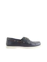 Navy blue boat shoe on a light gray background