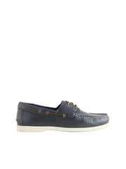 Navy blue boat shoe on a light gray background