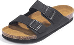 A pair of black double-strap slide sandals with silver-tone buckles, a tan footbed, and a cork-textured side edge, shown on a white background.
