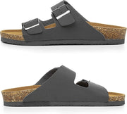 A pair of dark gray double-strap slide sandals with cork-look soles, shown from the side and top-down views against a white background.