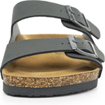A pair of double-strap slide sandals with wide black straps, silver buckles, and a natural cork footbed on a white background.