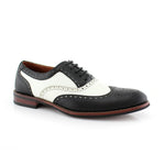 A handcrafted pair of black and white wingtip Oxford shoes made from premium genuine leather, designed for modern gentlemen who appreciate timeless craftsmanship and refined style.