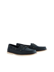 Pair of navy blue leather shoes on a light gray background